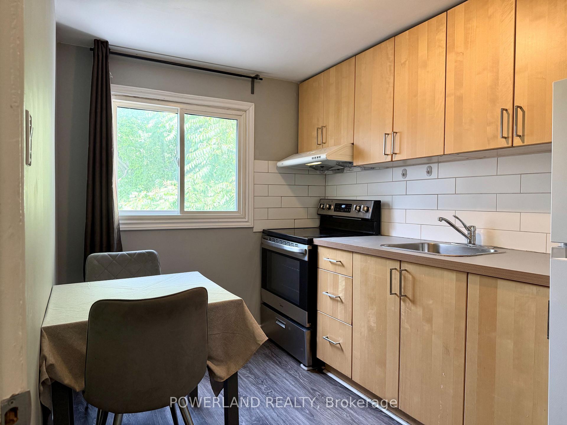 Photo 4 of Unit Apt A, 68 Carlaw Avenue, Toronto, South Riverdale — HOMEH