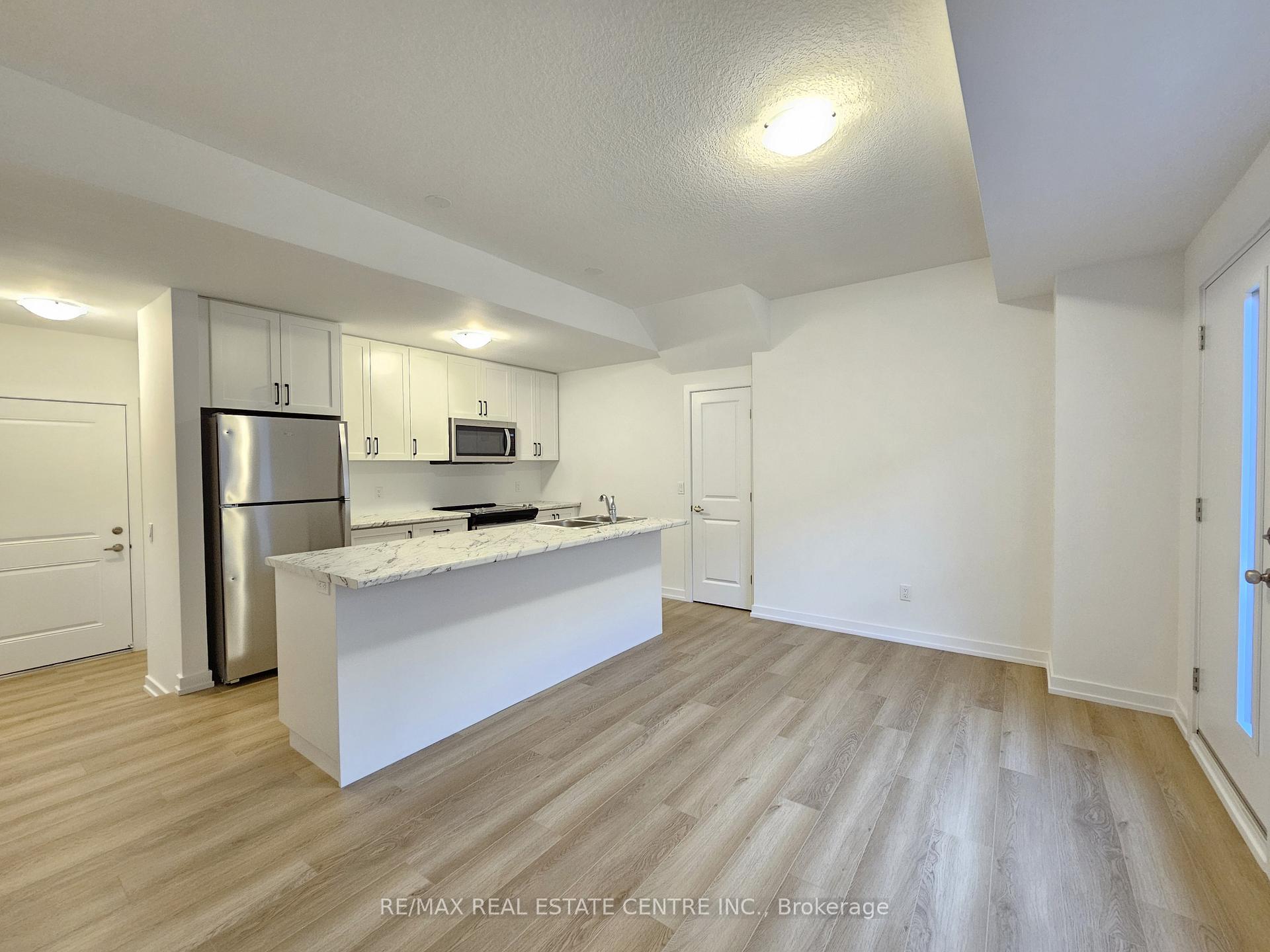 Photo 2 of Unit 11, 70 Kenesky Drive, Hamilton, Waterdown — HOMEH
