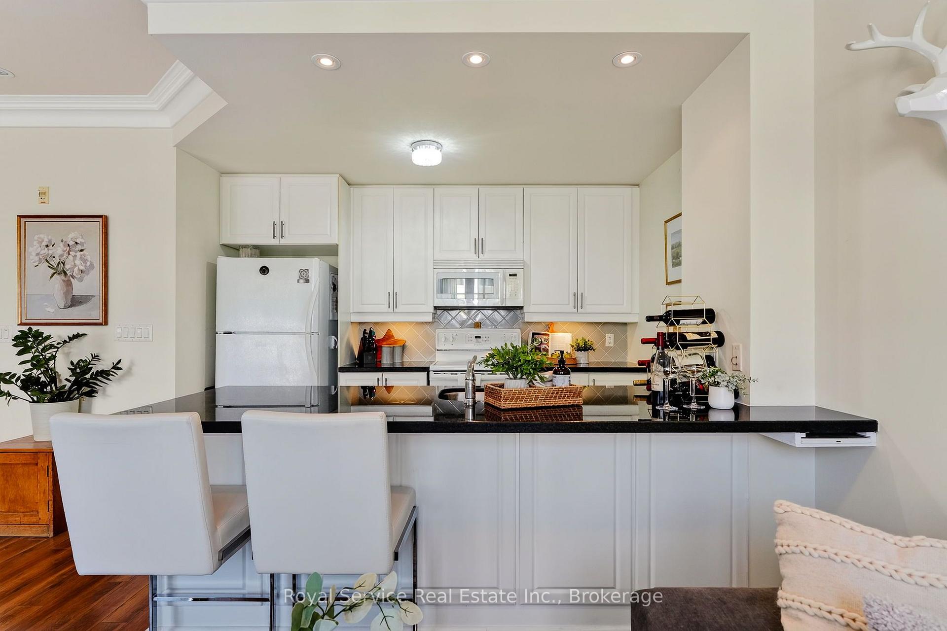 Photo 50 of Unit 206, 148 Third Street, Cobourg — HOMEH