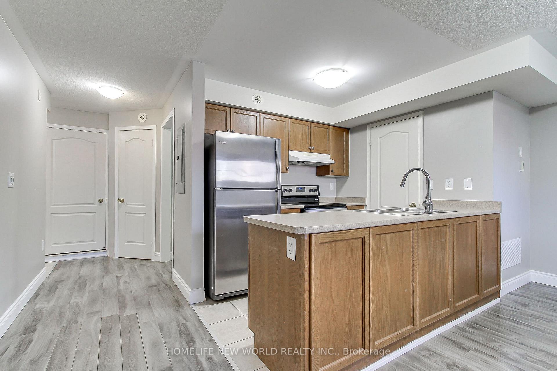 Photo 3 of Unit 3, 133 Isaac Devins Boulevard, North York, Humberlea-Pelmo Park — HOMEH