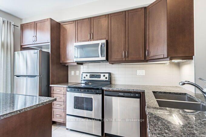 Photo 45 of Unit 23, 2034 Queensborough Gate, Mississauga, Erin Mills — HOMEH