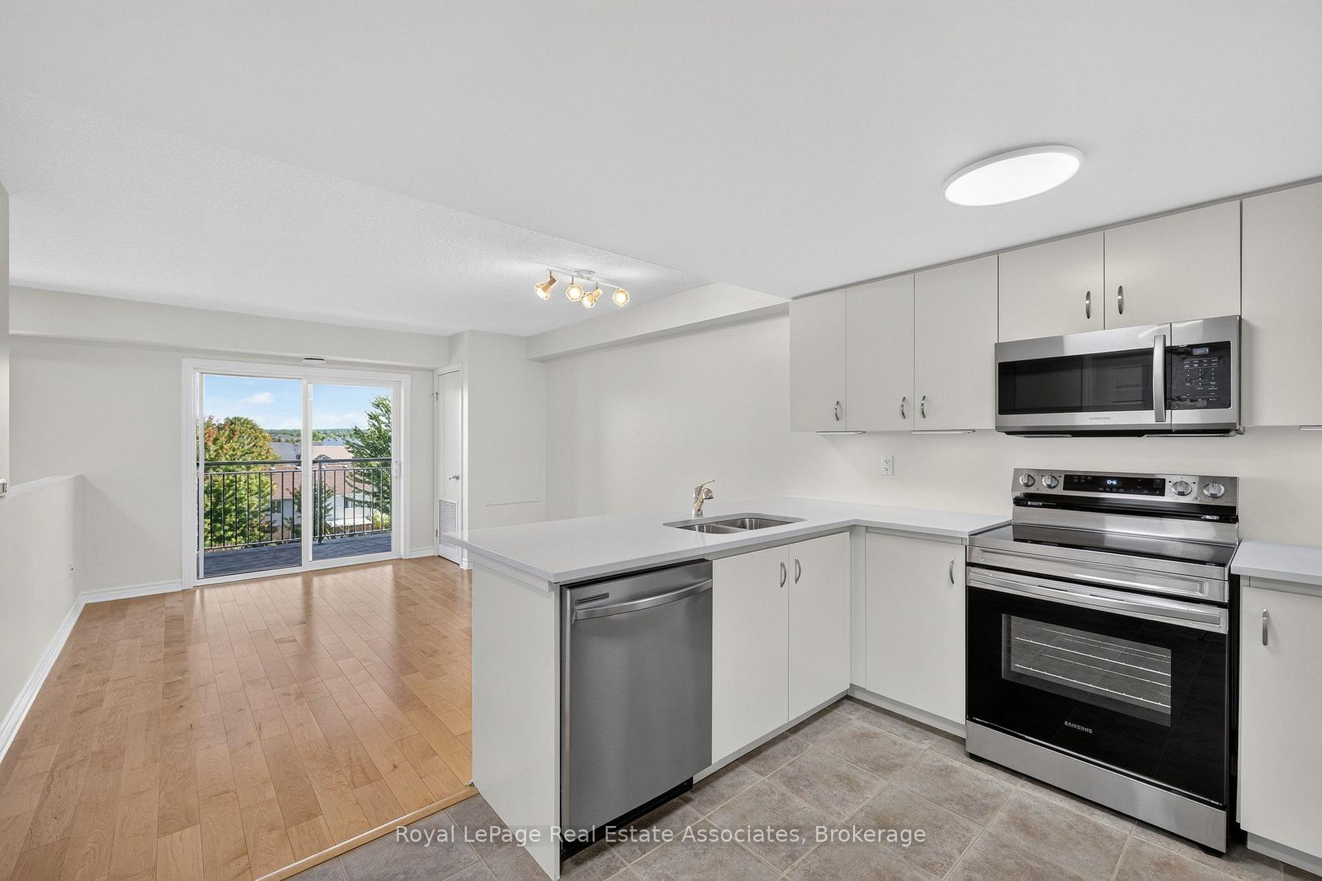 Photo 10 of Unit 401, 41 Goodwin Drive, Guelph, Pineridge/Westminster Woods — HOMEH