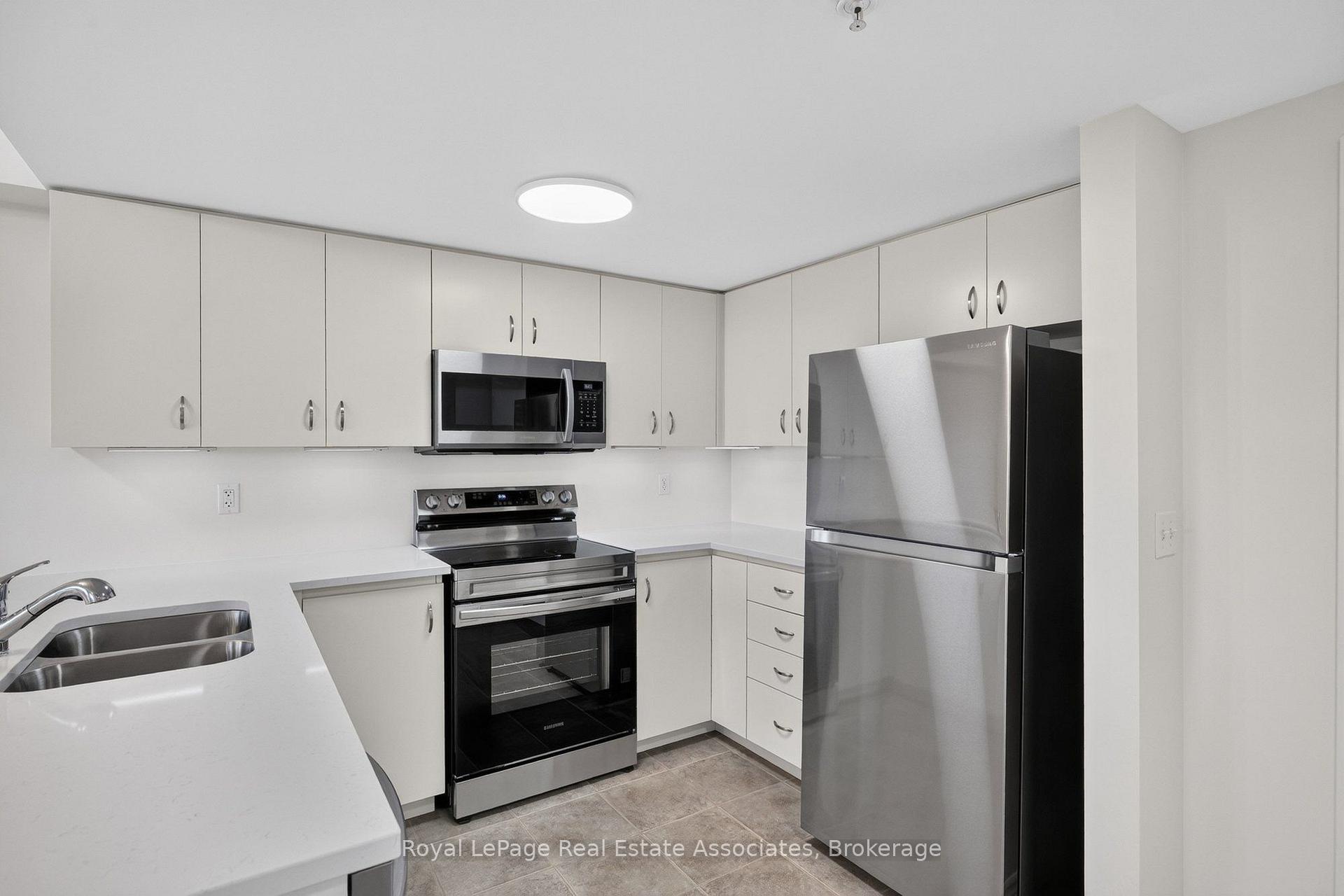Photo 11 of Unit 401, 41 Goodwin Drive, Guelph, Pineridge/Westminster Woods — HOMEH