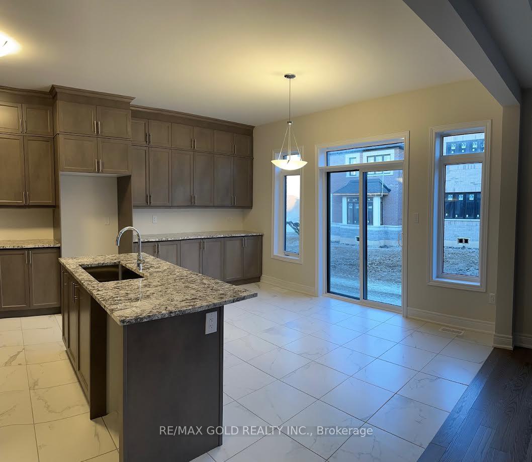 Photo 2 of 4 Michener Drive, Brampton, Sandringham-Wellington North — HOMEH