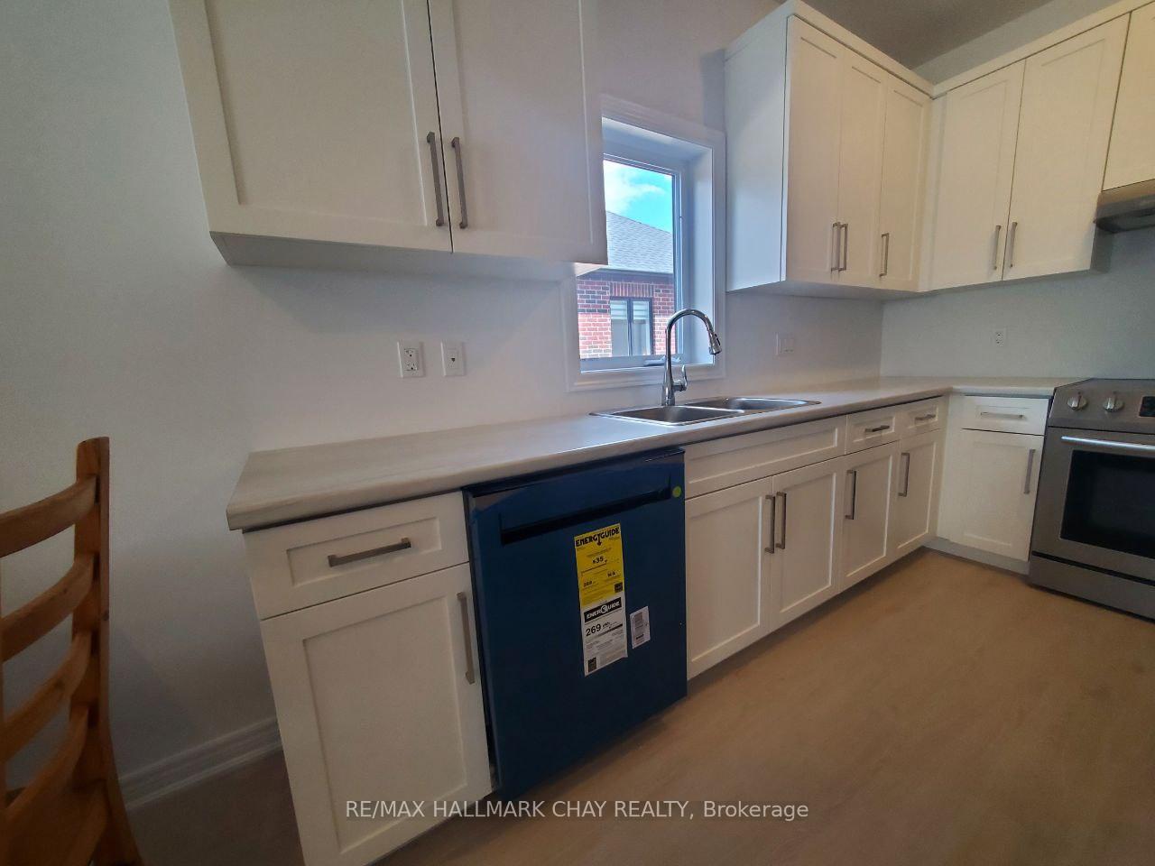 Photo 3 of 106 Emerson Way, West Grey — HOMEH