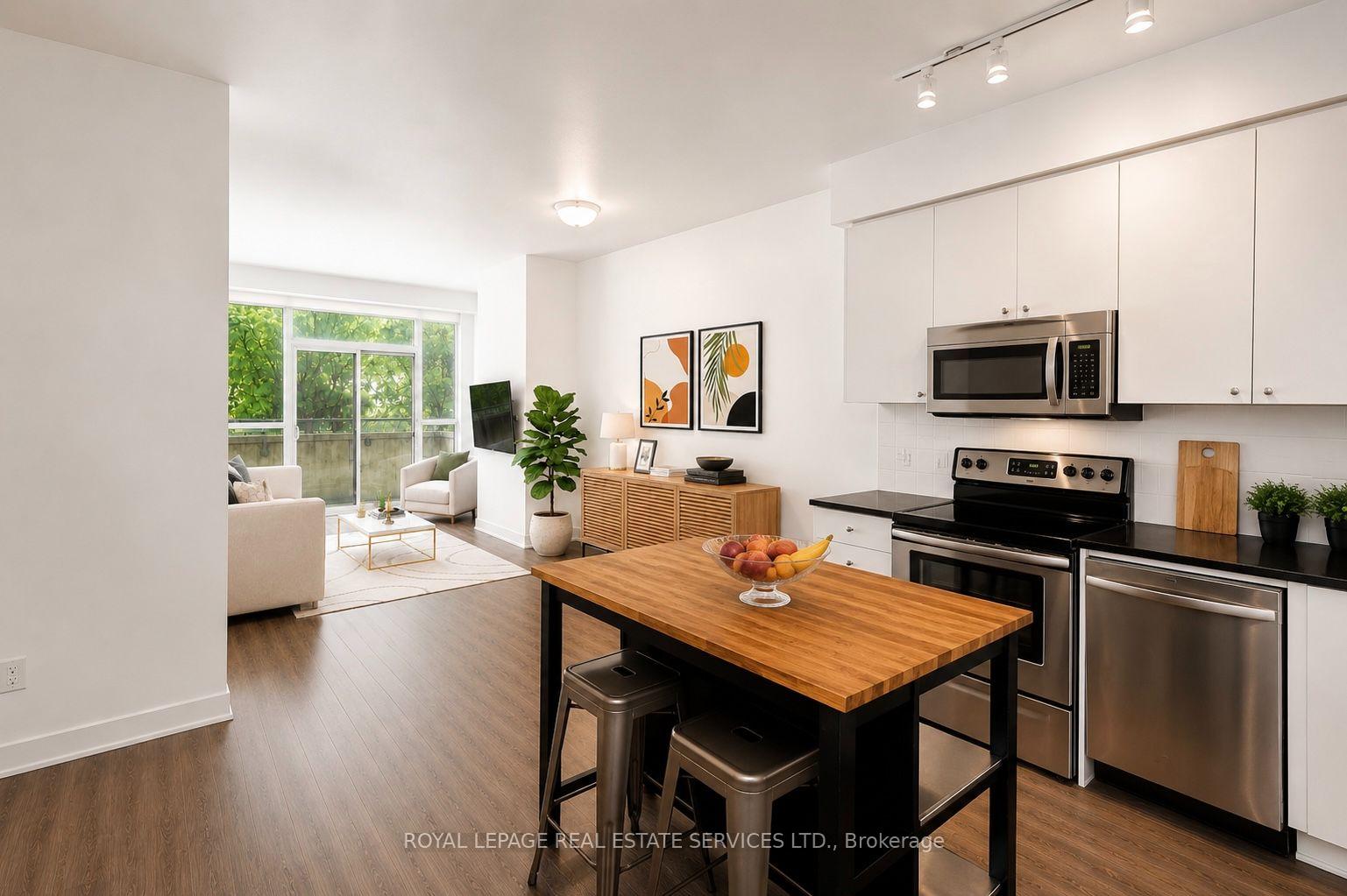 Photo 2 of Unit 414, 8 Fieldway Road, Etobicoke, Islington-City Centre West — HOMEH
