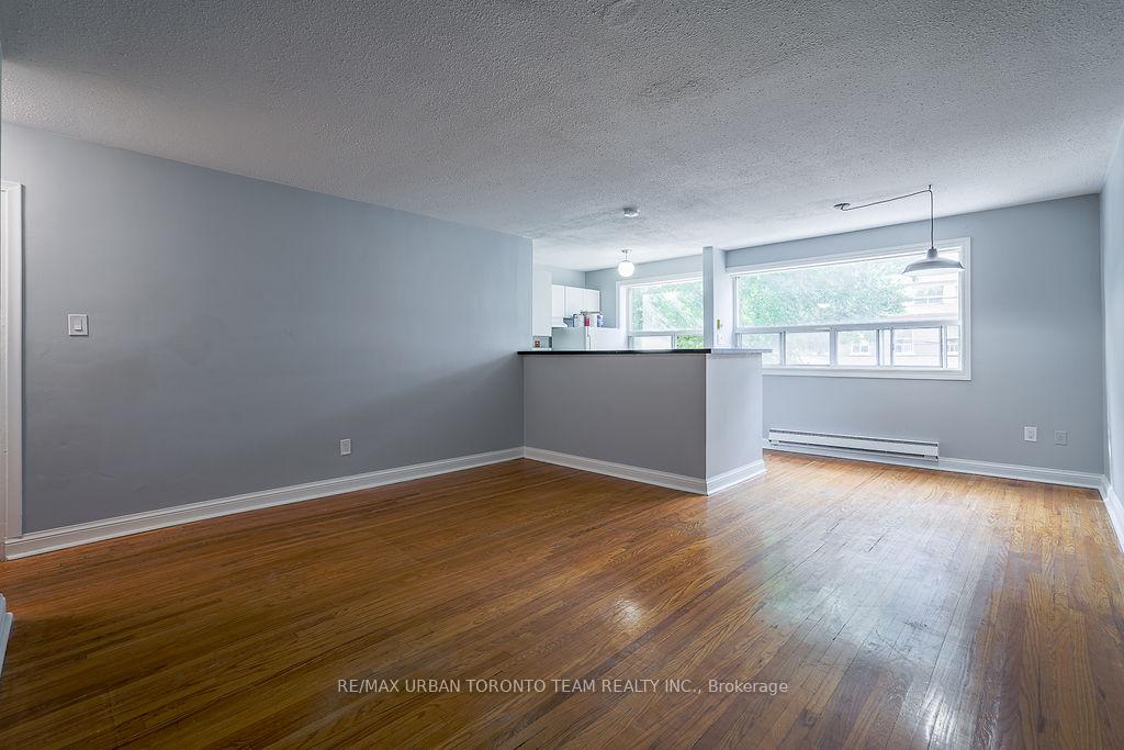 Photo 1 of Unit 1, 1346 Queen Street E, Toronto, South Riverdale — HOMEH