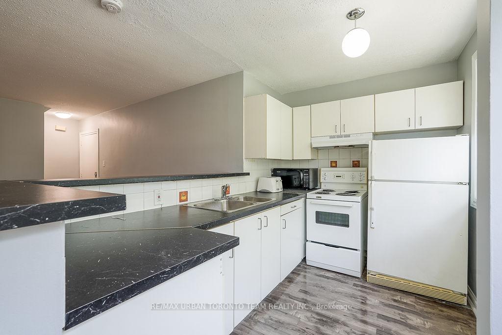 Photo 5 of Unit 1, 1346 Queen Street E, Toronto, South Riverdale — HOMEH