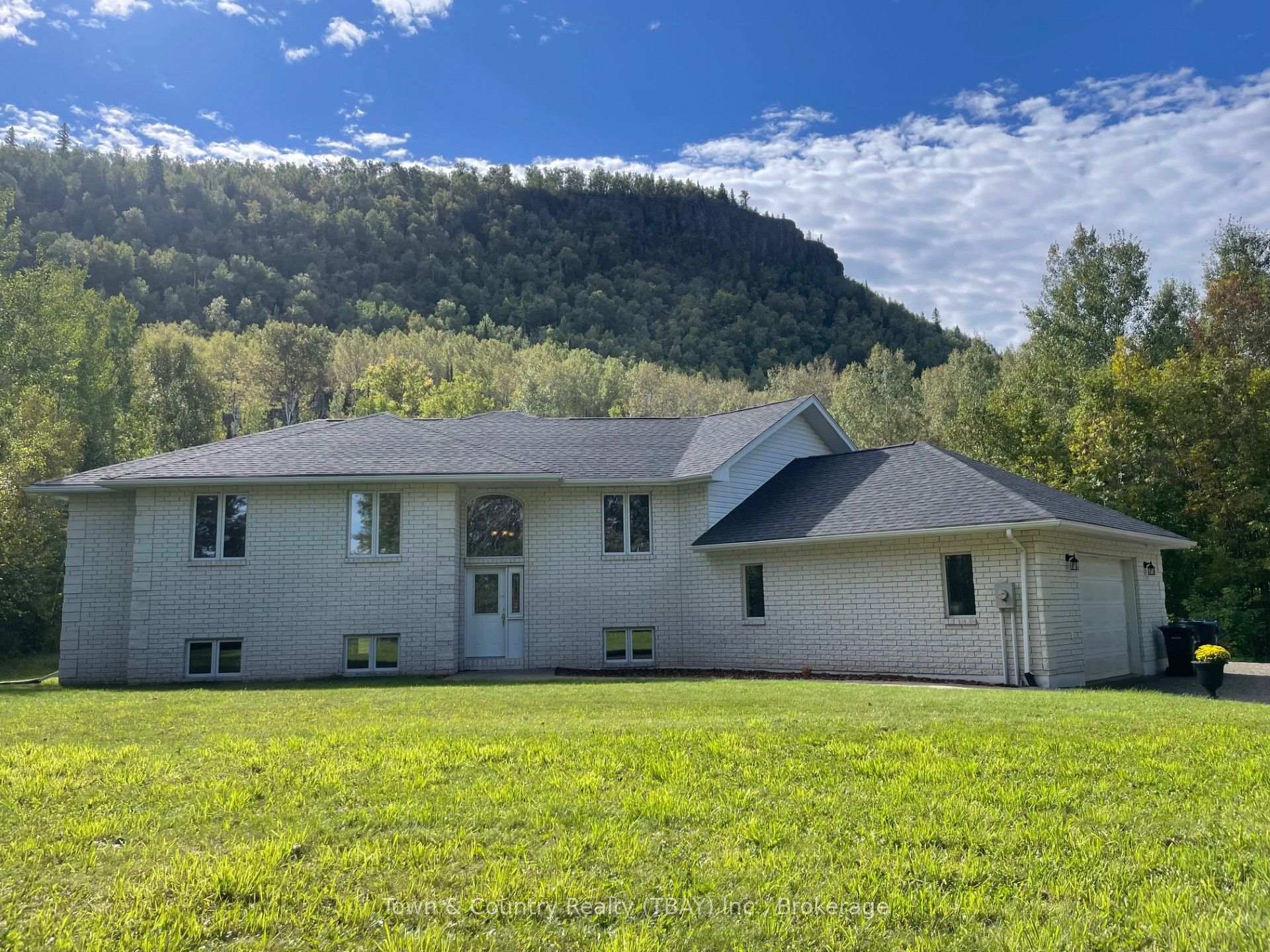 Photo 1 of 1990 Loch Lomond Road, Thunder Bay, Mountain Road — HOMEH