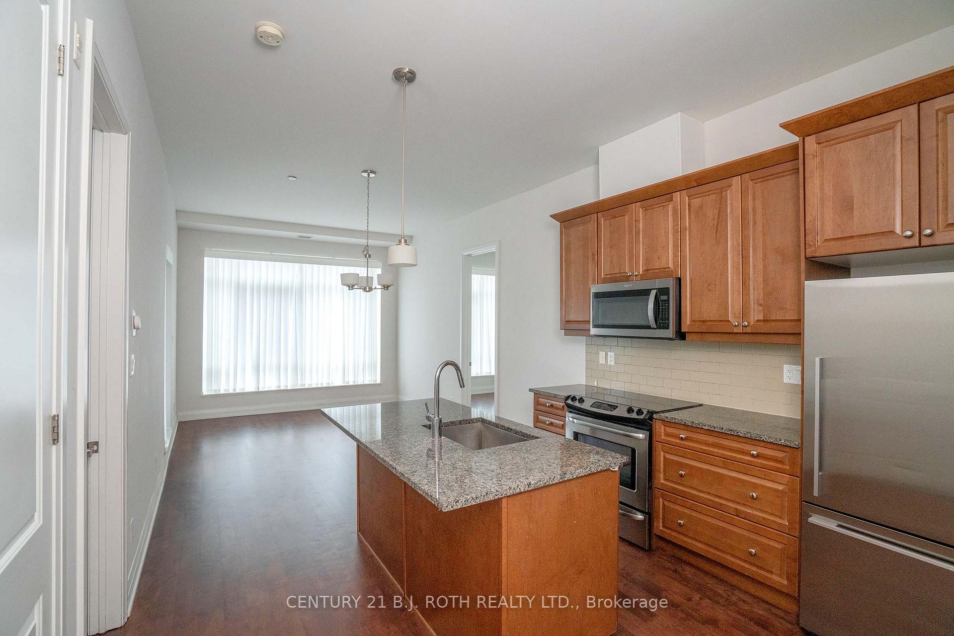 Photo 6 of Unit 313, 15277 Yonge Street S, Aurora, Aurora Village — HOMEH