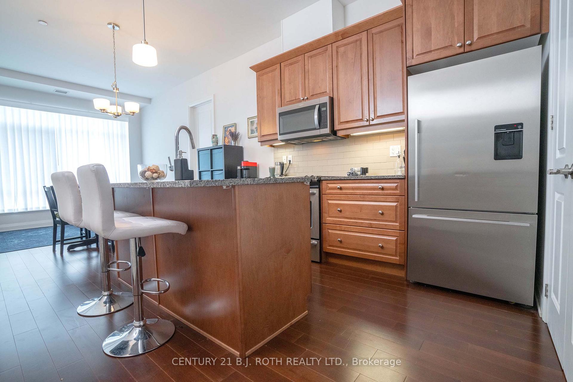 Photo 7 of Unit 313, 15277 Yonge Street S, Aurora, Aurora Village — HOMEH