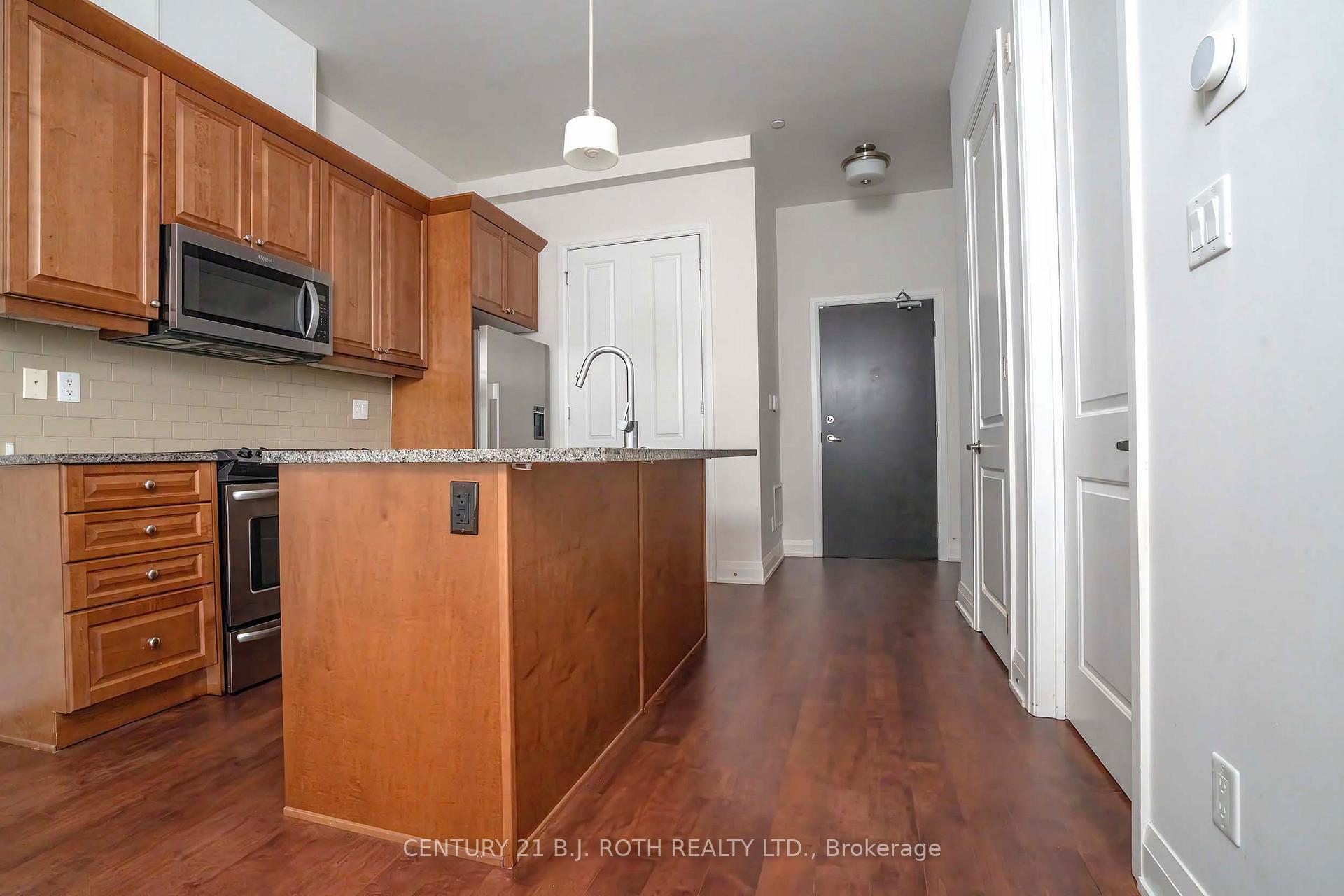 Photo 8 of Unit 313, 15277 Yonge Street S, Aurora, Aurora Village — HOMEH