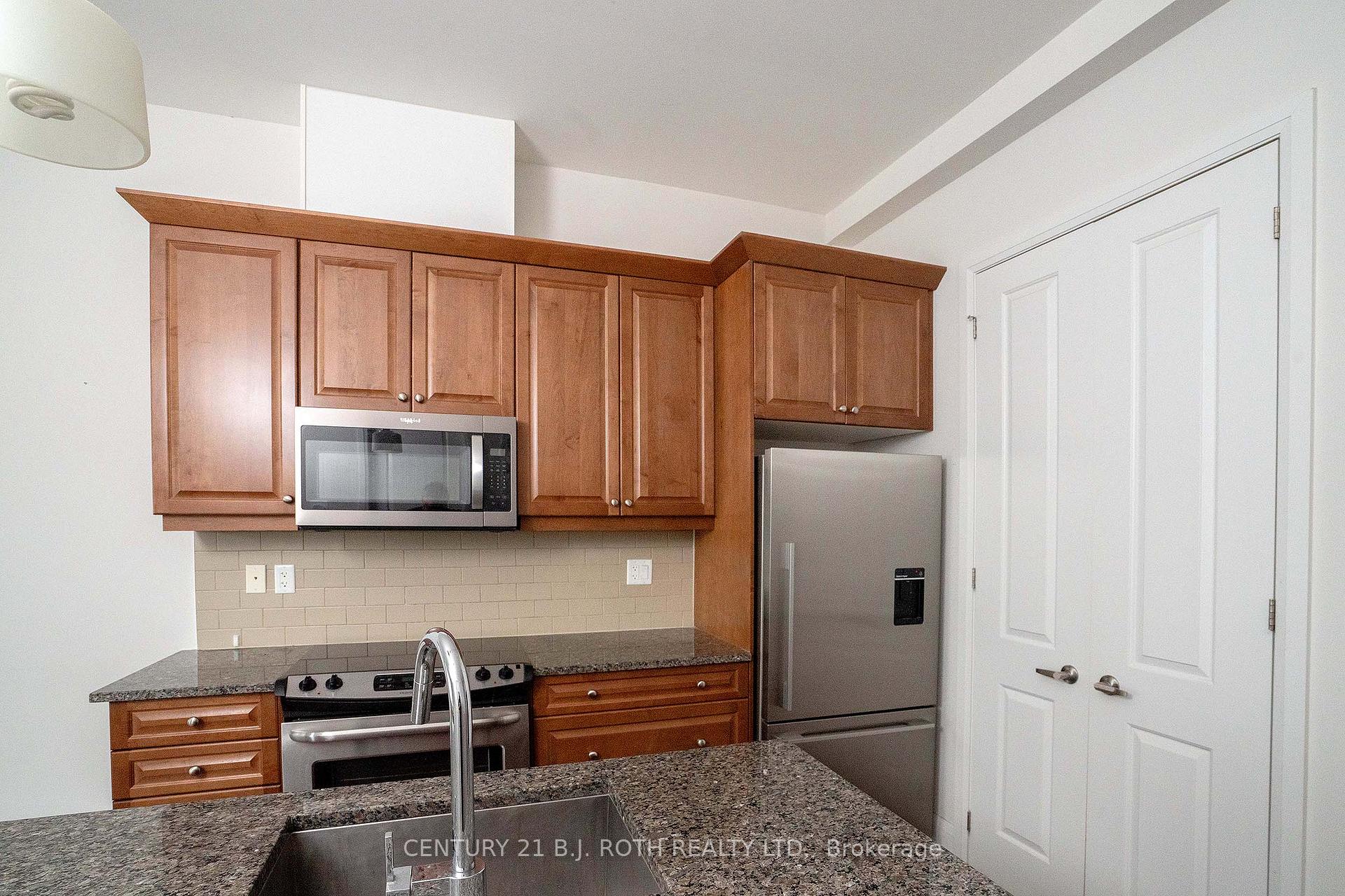 Photo 10 of Unit 313, 15277 Yonge Street S, Aurora, Aurora Village — HOMEH