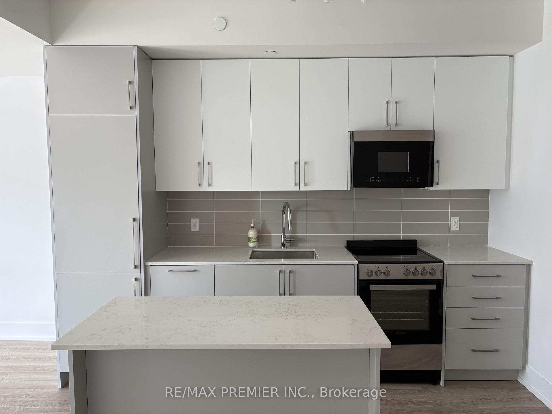 Photo 2 of Unit 219, 2075 King Road, King, King City — HOMEH