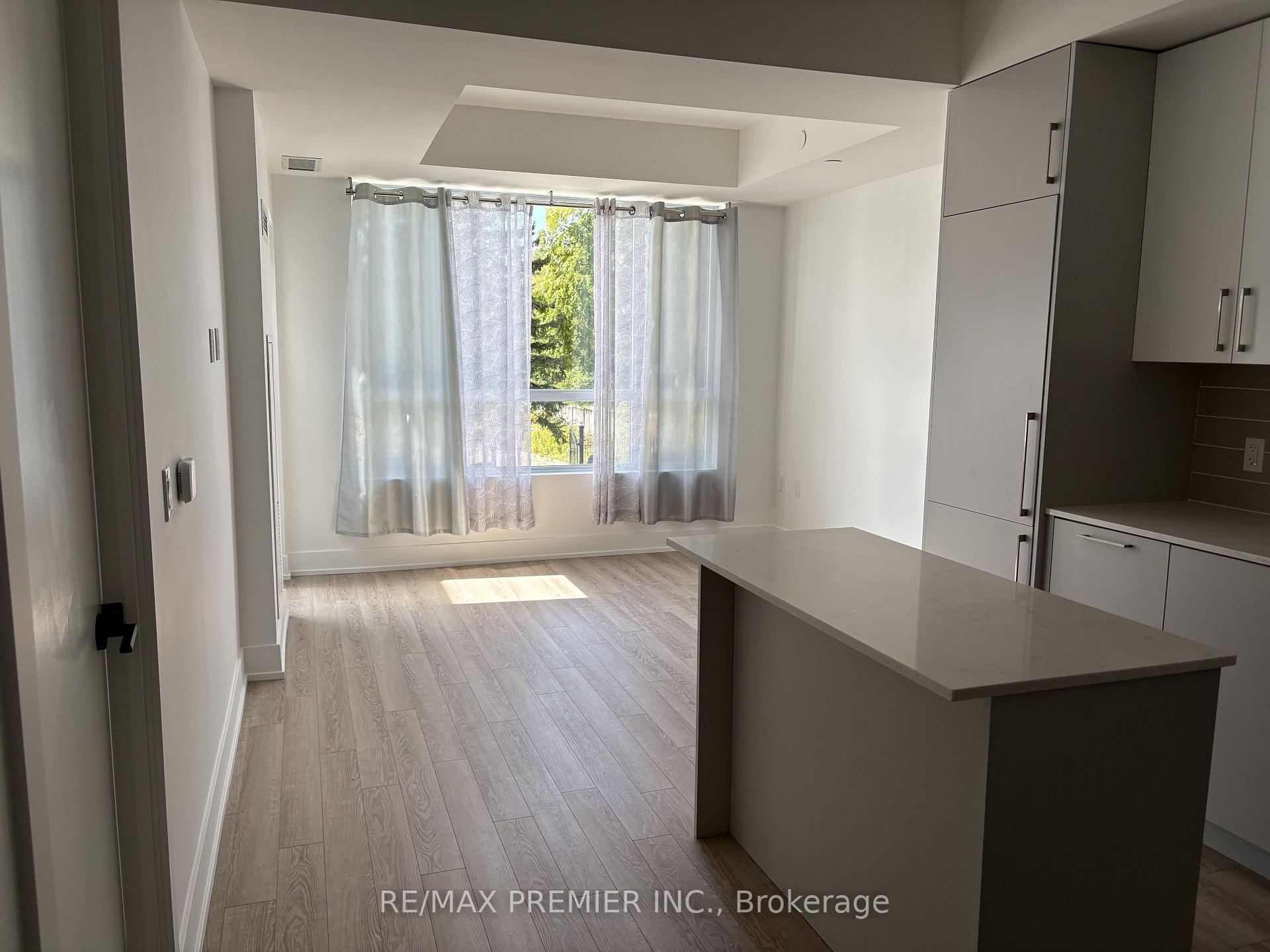 Photo 4 of Unit 219, 2075 King Road, King, King City — HOMEH
