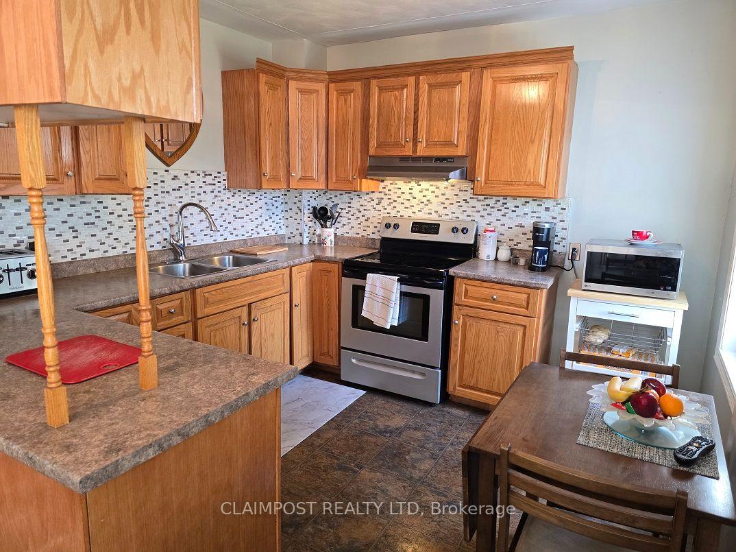 Photo 7 of 406 Maple Street S, Timmins, TS - SE — HOMEH