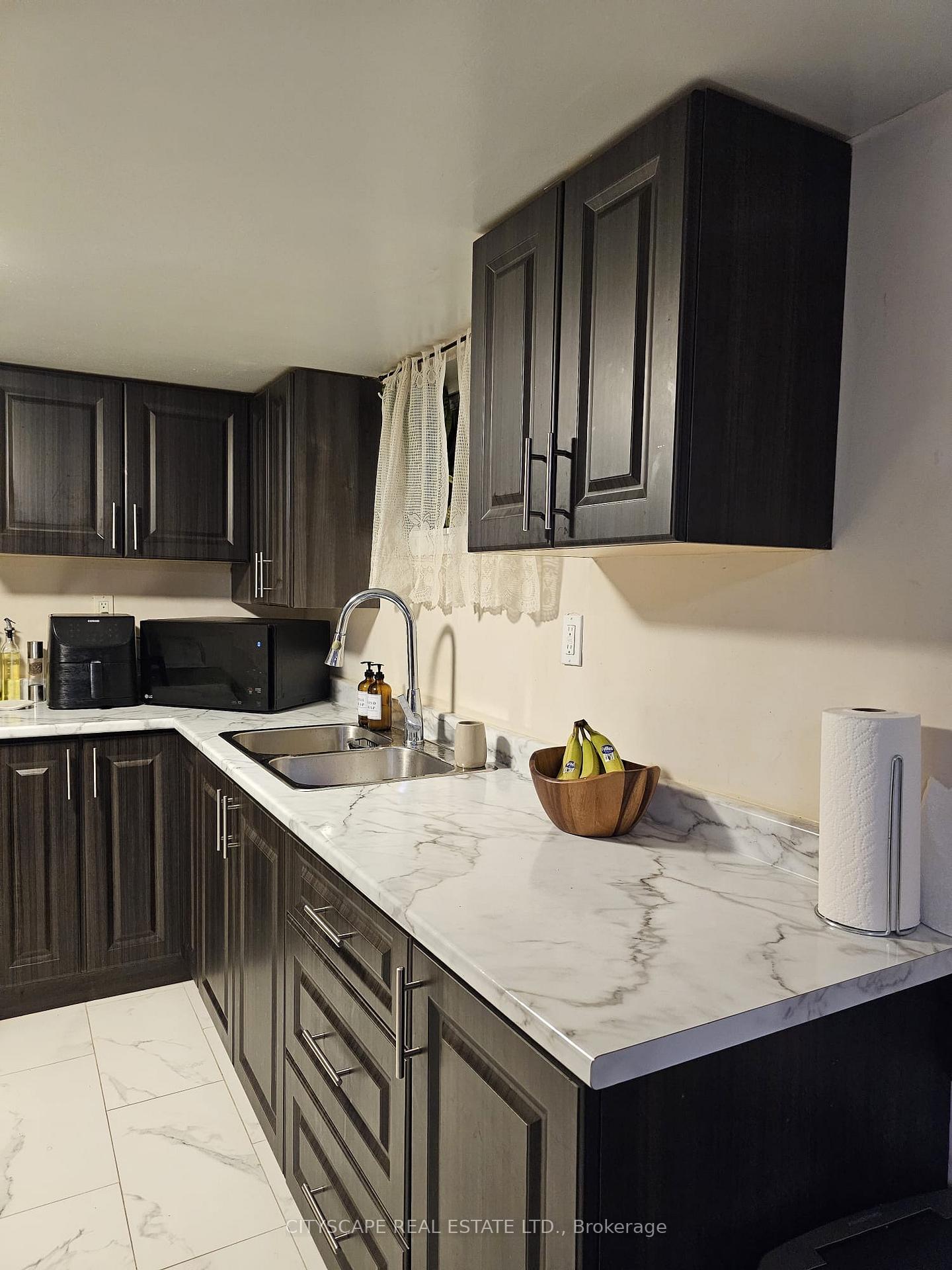 Photo 2 of Unit Bsmt, 61 Farmbrook Road, Scarborough, Woburn — HOMEH