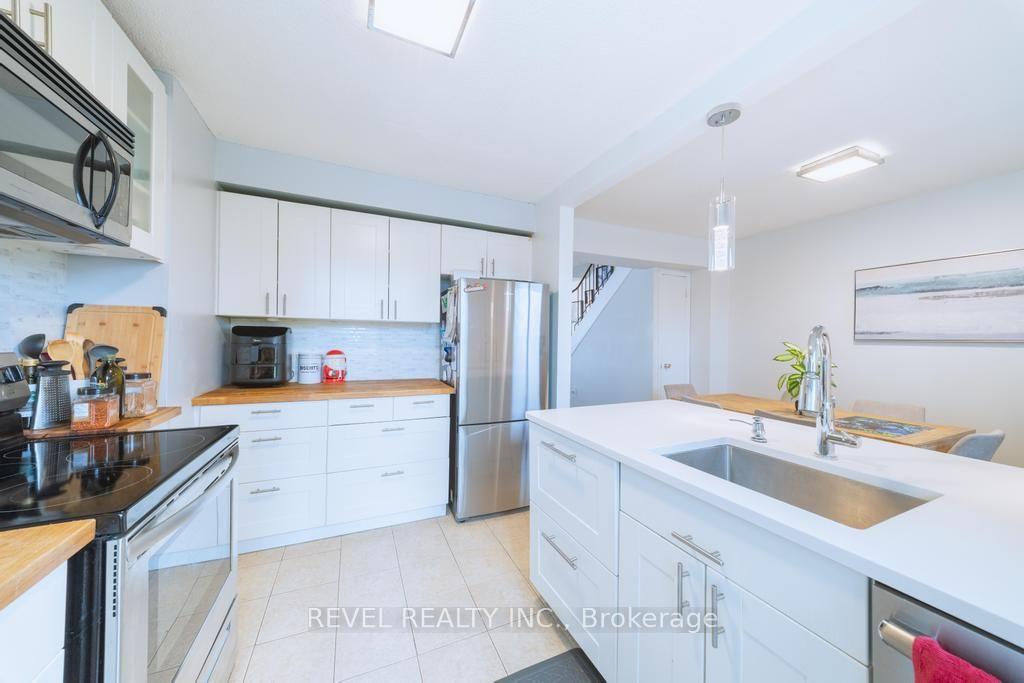 Photo 7 of Unit A3, 63 Ferris Lane, Barrie, Cundles East — HOMEH
