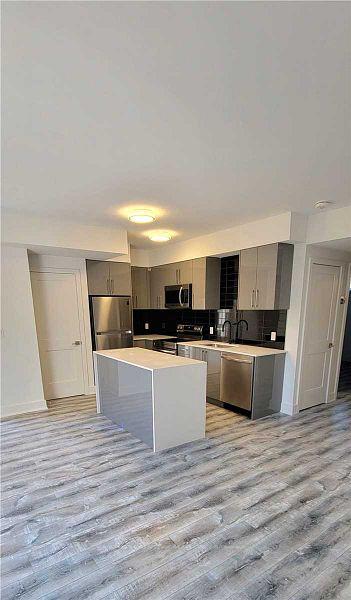 Photo 3 of Unit 102, 6065 McLEOD Road, Niagara Falls, Arad/Fallsview — HOMEH