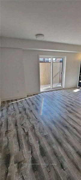 Photo 4 of Unit 102, 6065 McLEOD Road, Niagara Falls, Arad/Fallsview — HOMEH