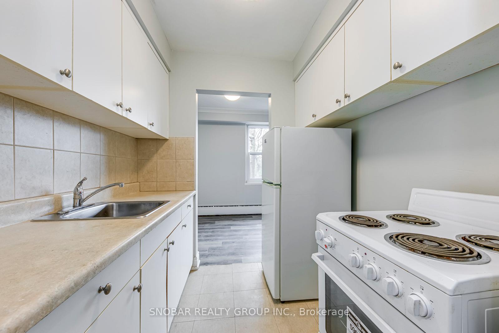 Photo 3 of Unit #11, 17 Station Road, Etobicoke, Mimico — HOMEH
