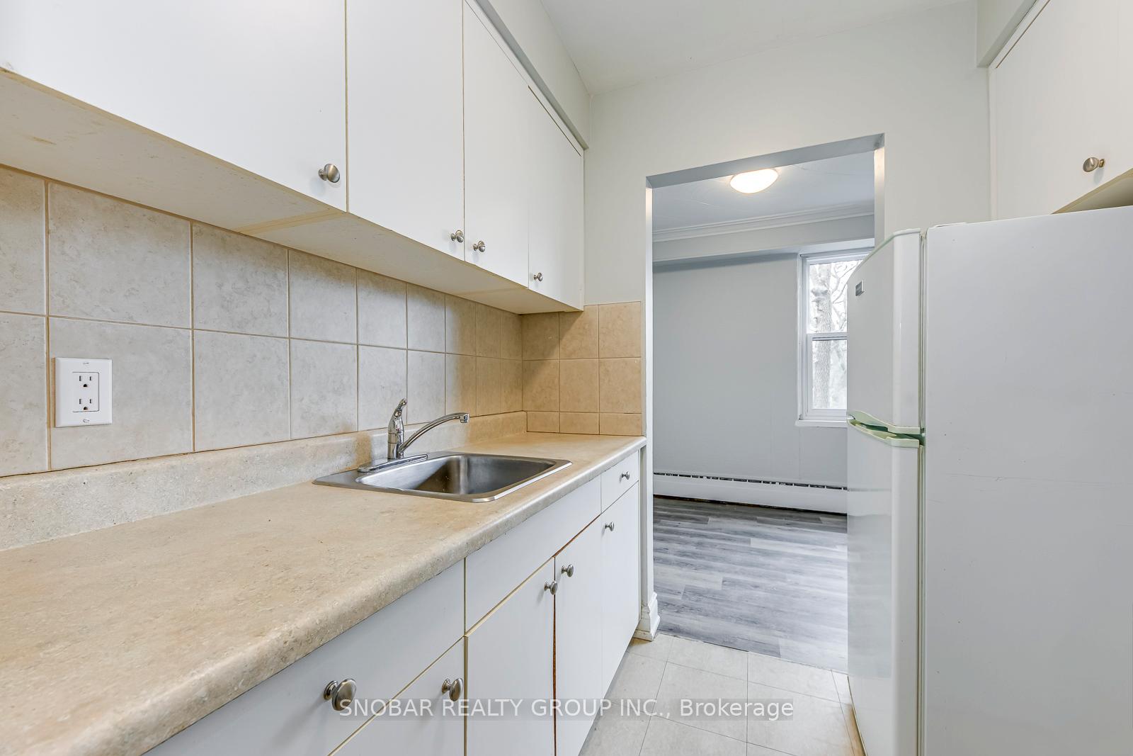 Photo 4 of Unit #11, 17 Station Road, Etobicoke, Mimico — HOMEH