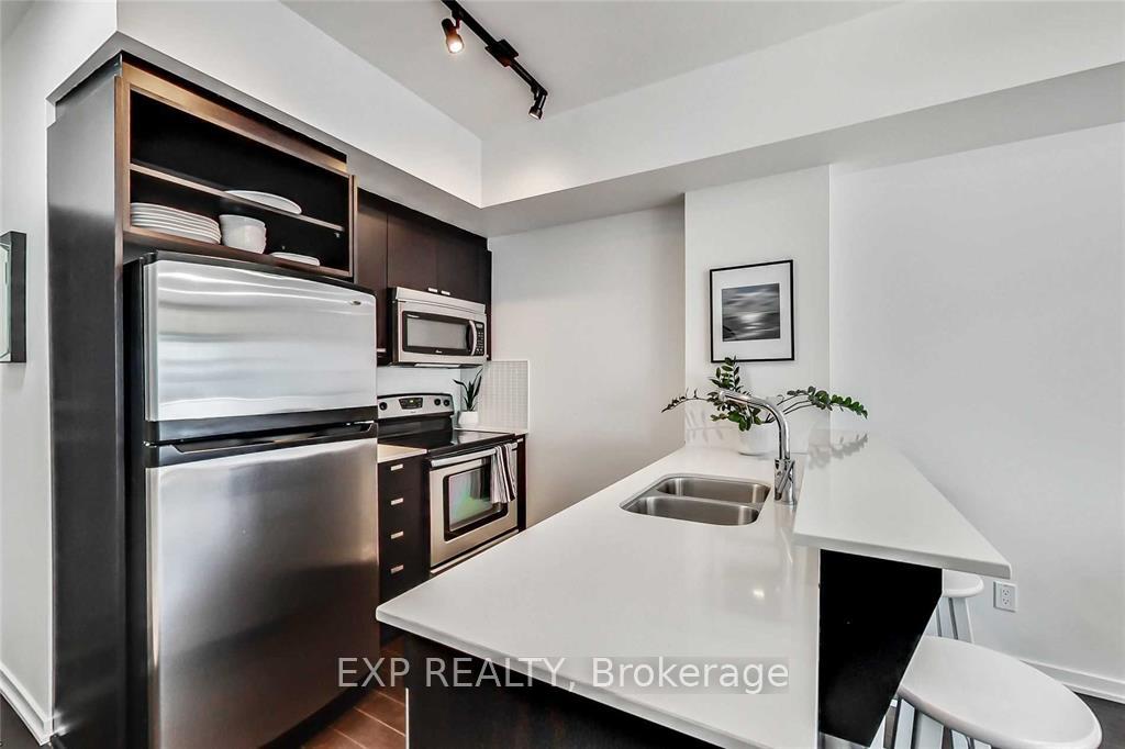 Photo 4 of Unit 2607, 103 The Queensway, Toronto, High Park-Swansea — HOMEH
