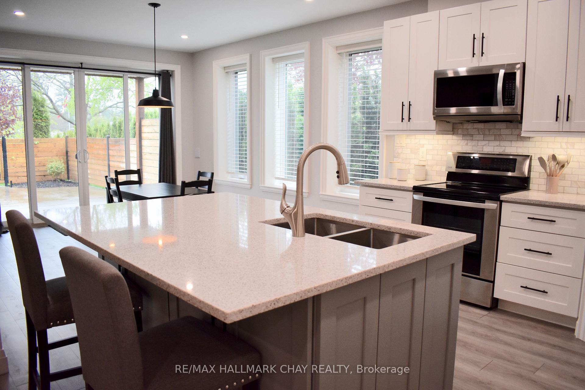Photo 8 of 1448 B River Road, Wasaga Beach — HOMEH
