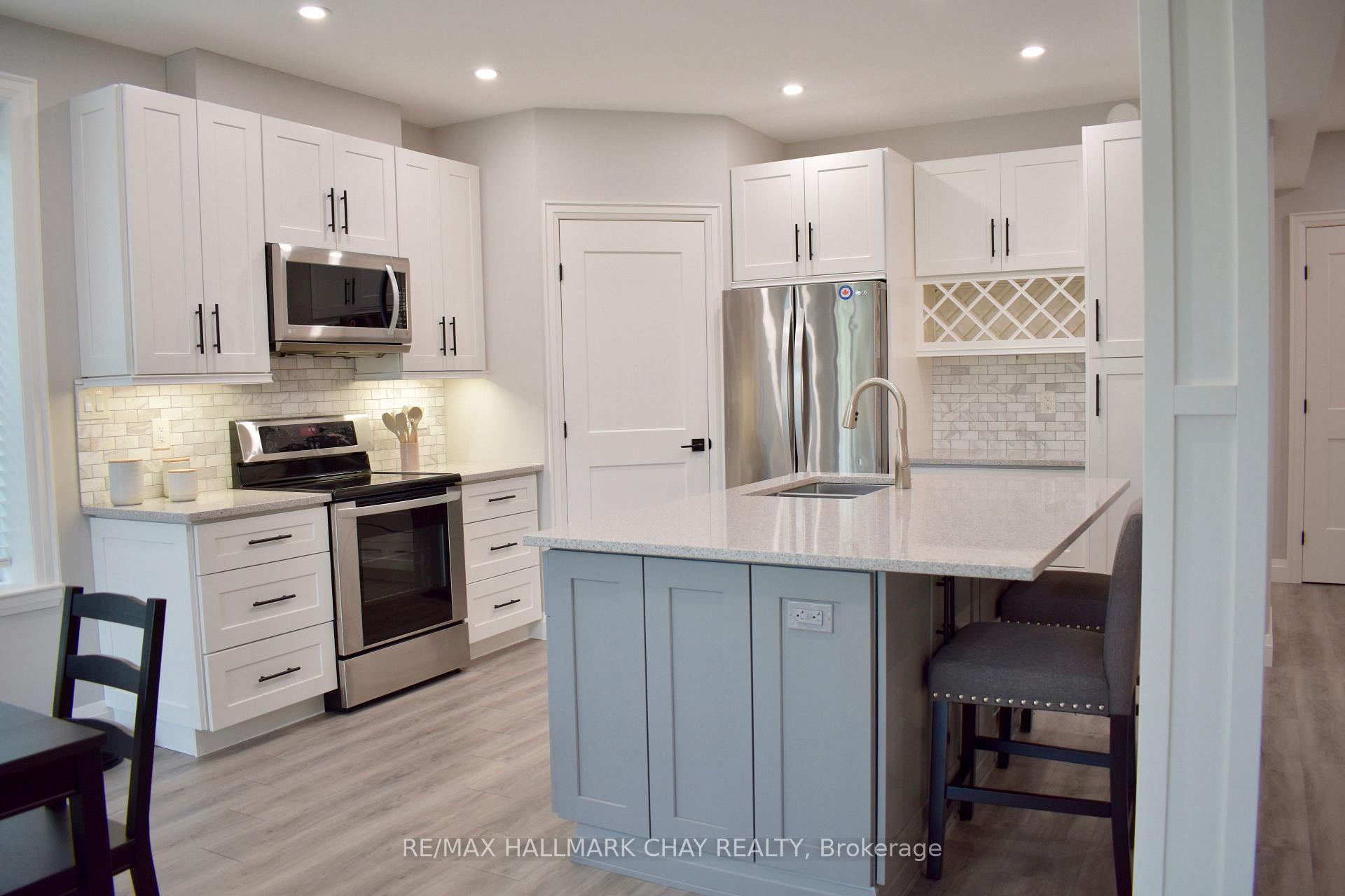 Photo 9 of 1448 B River Road, Wasaga Beach — HOMEH