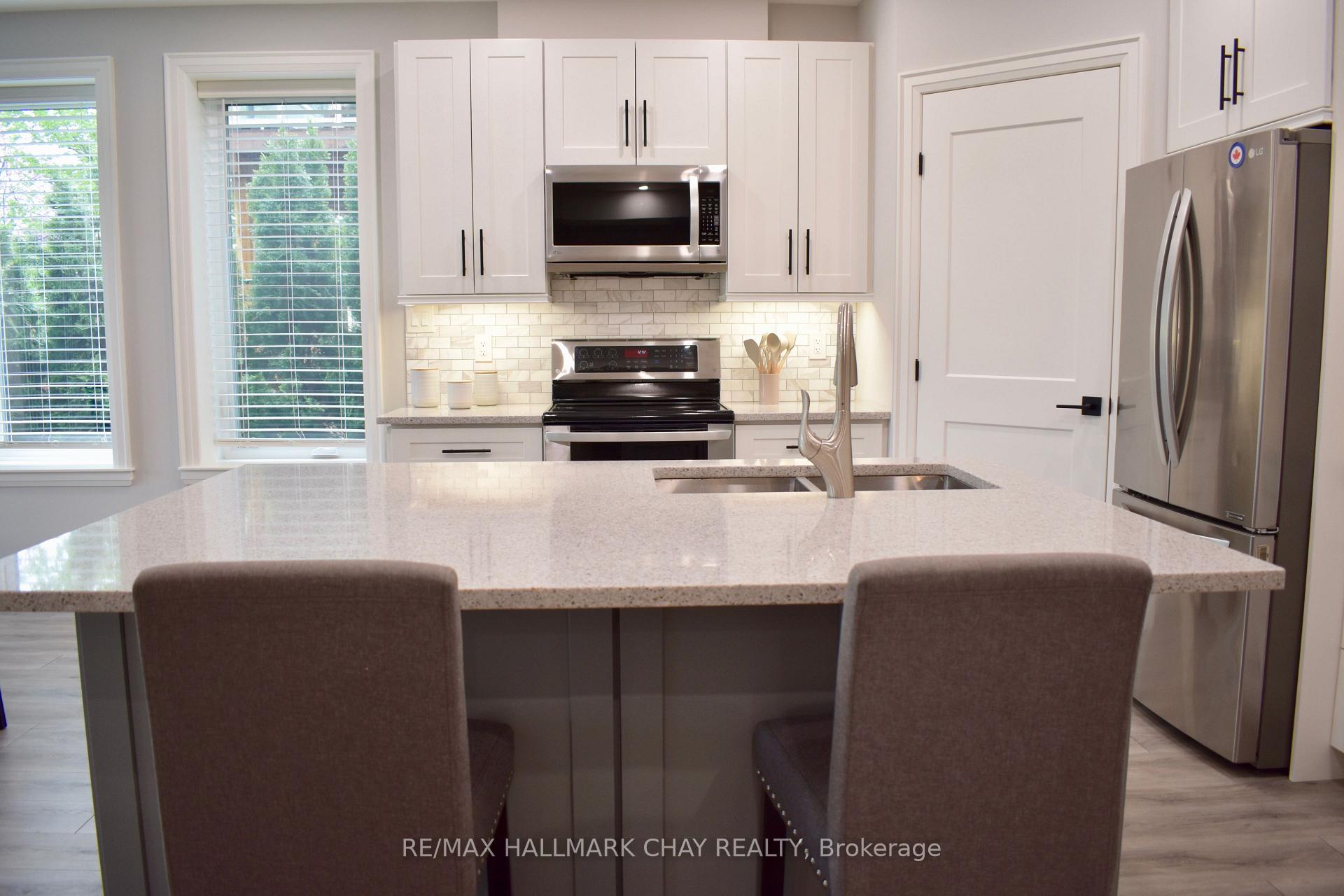 Photo 11 of 1448 B River Road, Wasaga Beach — HOMEH
