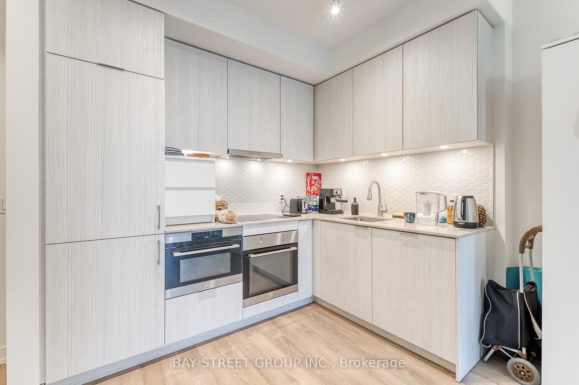 Photo 4 of Unit 210, 158 Front Street E, Toronto, Moss Park — HOMEH