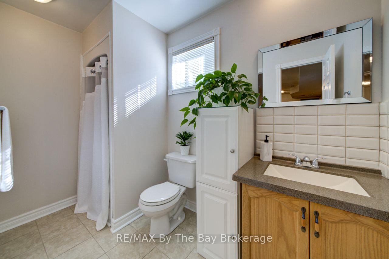 Photo 25 of 29 Downer Crescent, Wasaga Beach — HOMEH