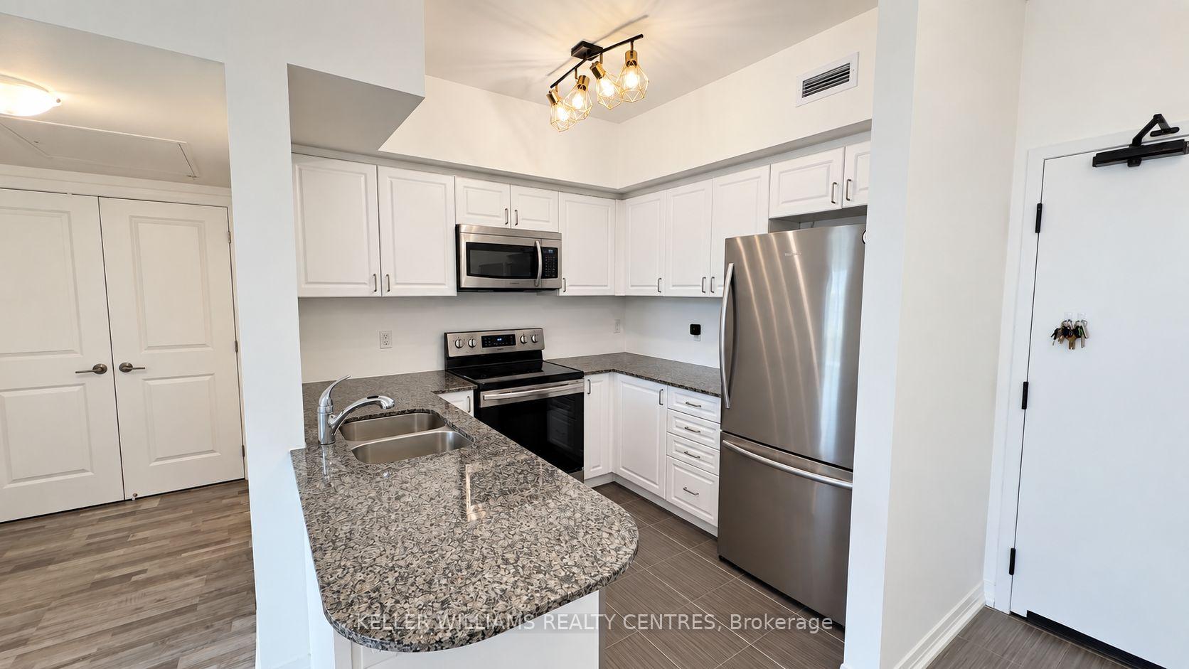 Photo 2 of Unit 409, 20 Koda Street, Barrie, Rural Barrie Southwest — HOMEH