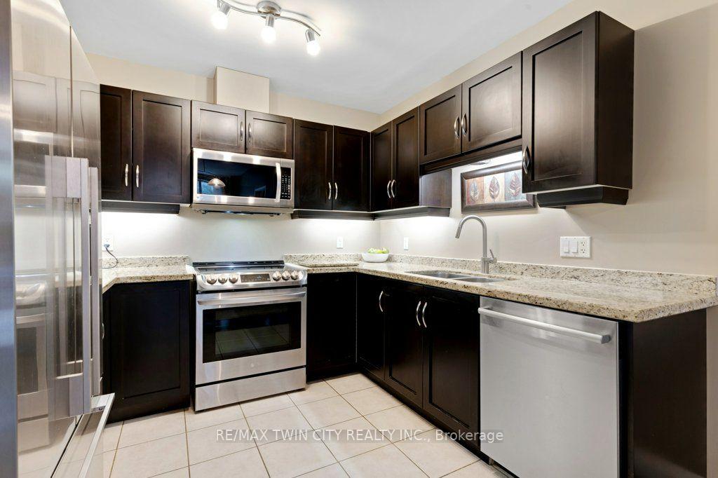 Photo 2 of Unit 105, 165 Duke Street E, Kitchener, City Commercial Core — HOMEH