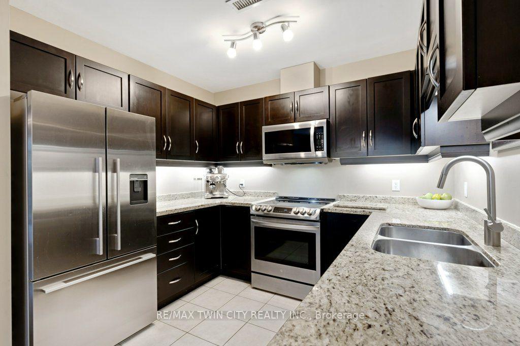 Photo 3 of Unit 105, 165 Duke Street E, Kitchener, City Commercial Core — HOMEH