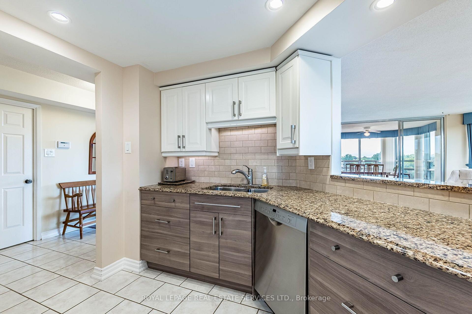 Photo 7 of Unit 609, 310 Mill Street S, Brampton, Brampton South — HOMEH