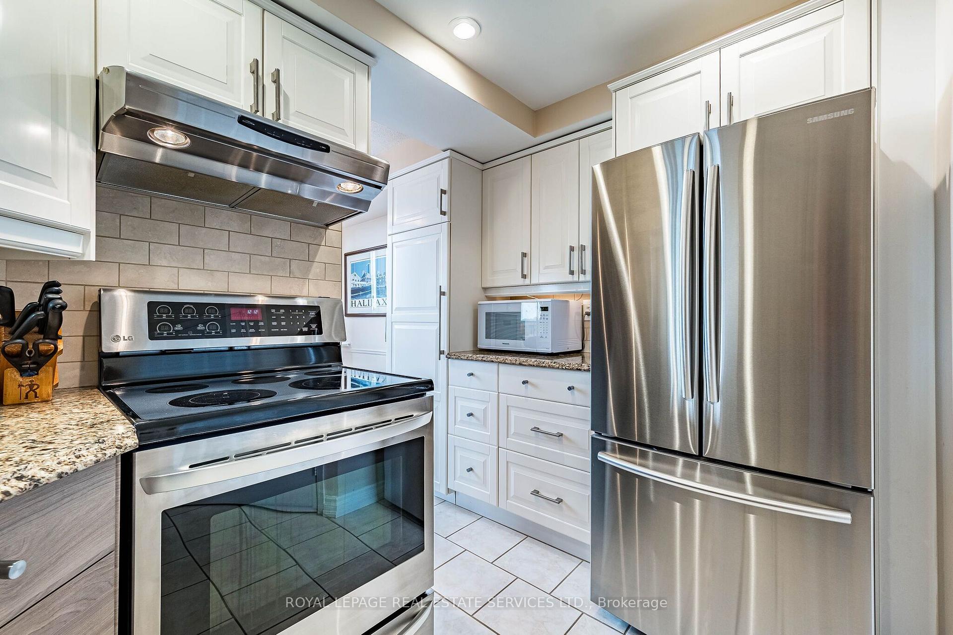 Photo 9 of Unit 609, 310 Mill Street S, Brampton, Brampton South — HOMEH
