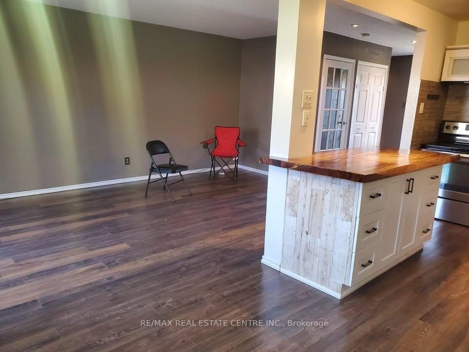 Photo 4 of Unit 20, 57 Hansen Road N, Brampton, Madoc — HOMEH
