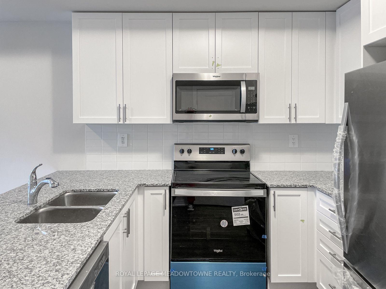 Photo 3 of Unit 107, 1565 Rose Way, Milton, Cobban — HOMEH