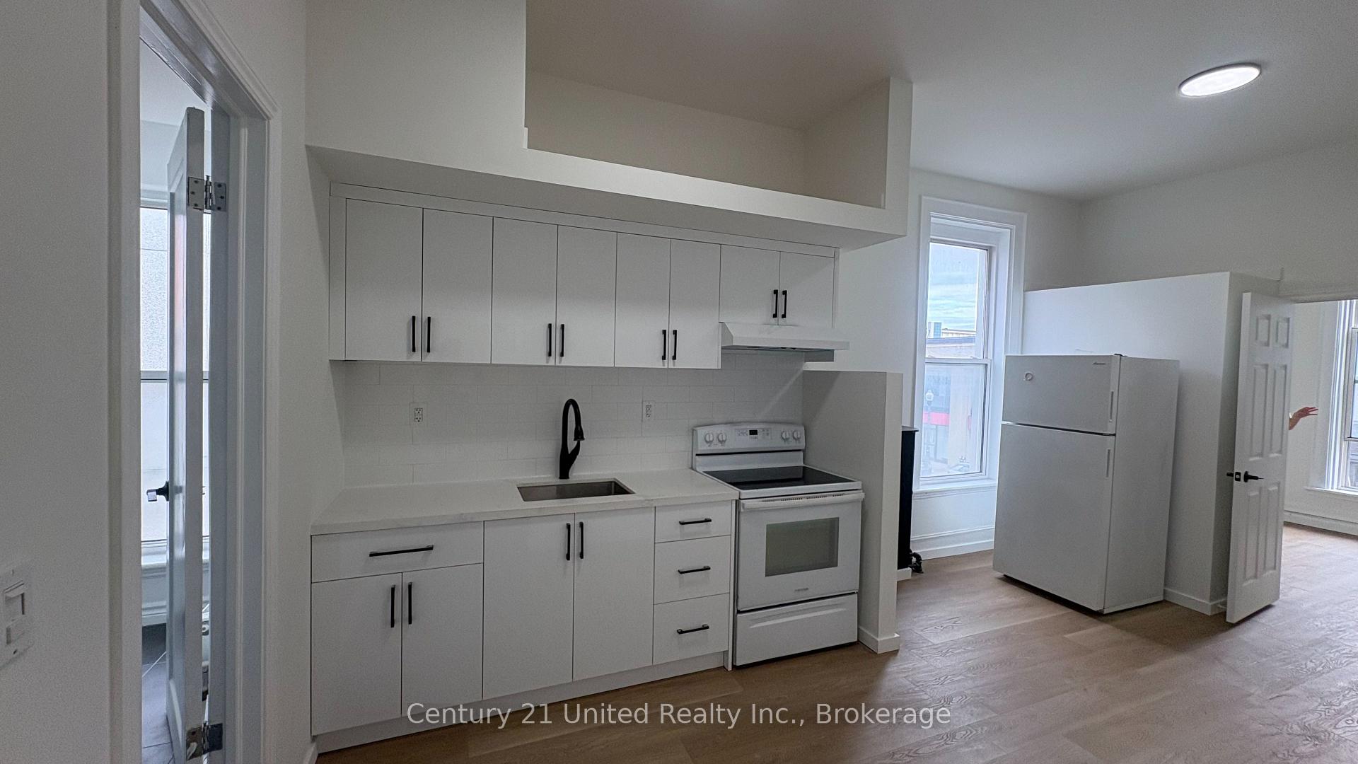 Photo 2 of Unit 9, 172.5 Hunter Street W, Peterborough, Town Ward 3 — HOMEH