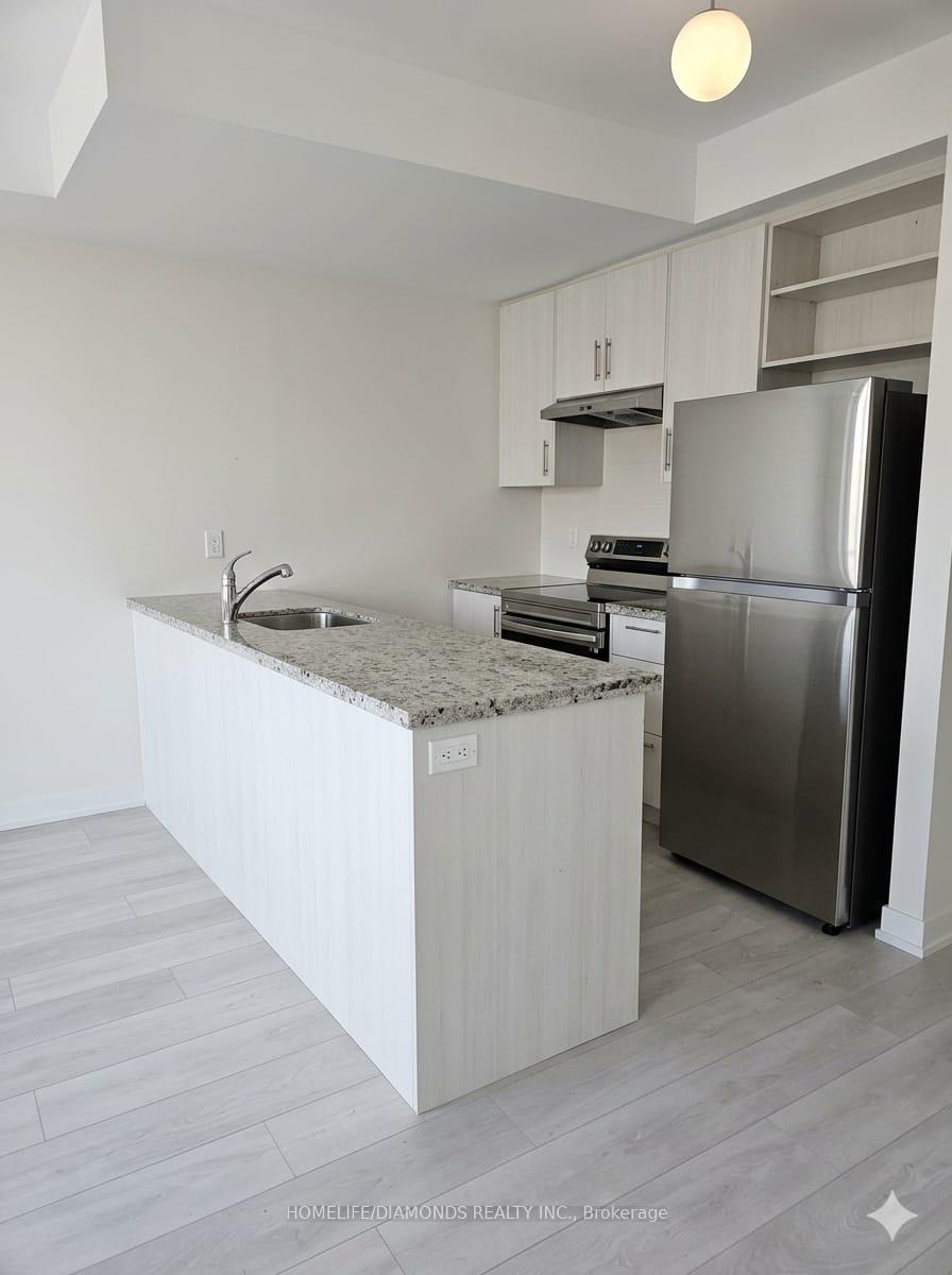 Photo 2 of Unit 504, 40 Halliford Place, Brampton, Goreway Drive Corridor — HOMEH