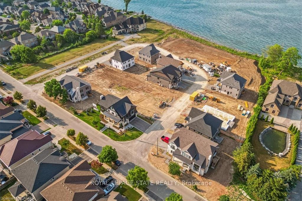 Photo 3 of Unit 19, 100 Watershore Drive, Hamilton, Stoney Creek — HOMEH