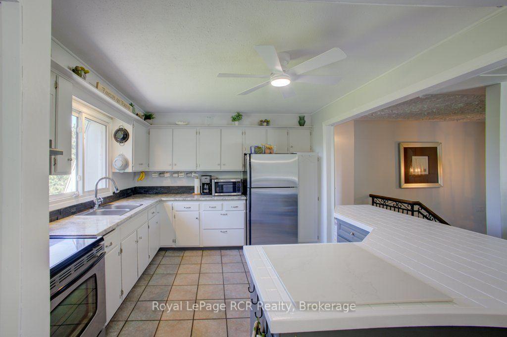 Photo 12 of 15 Booth Street E, Mapleton, Rural Mapleton — HOMEH