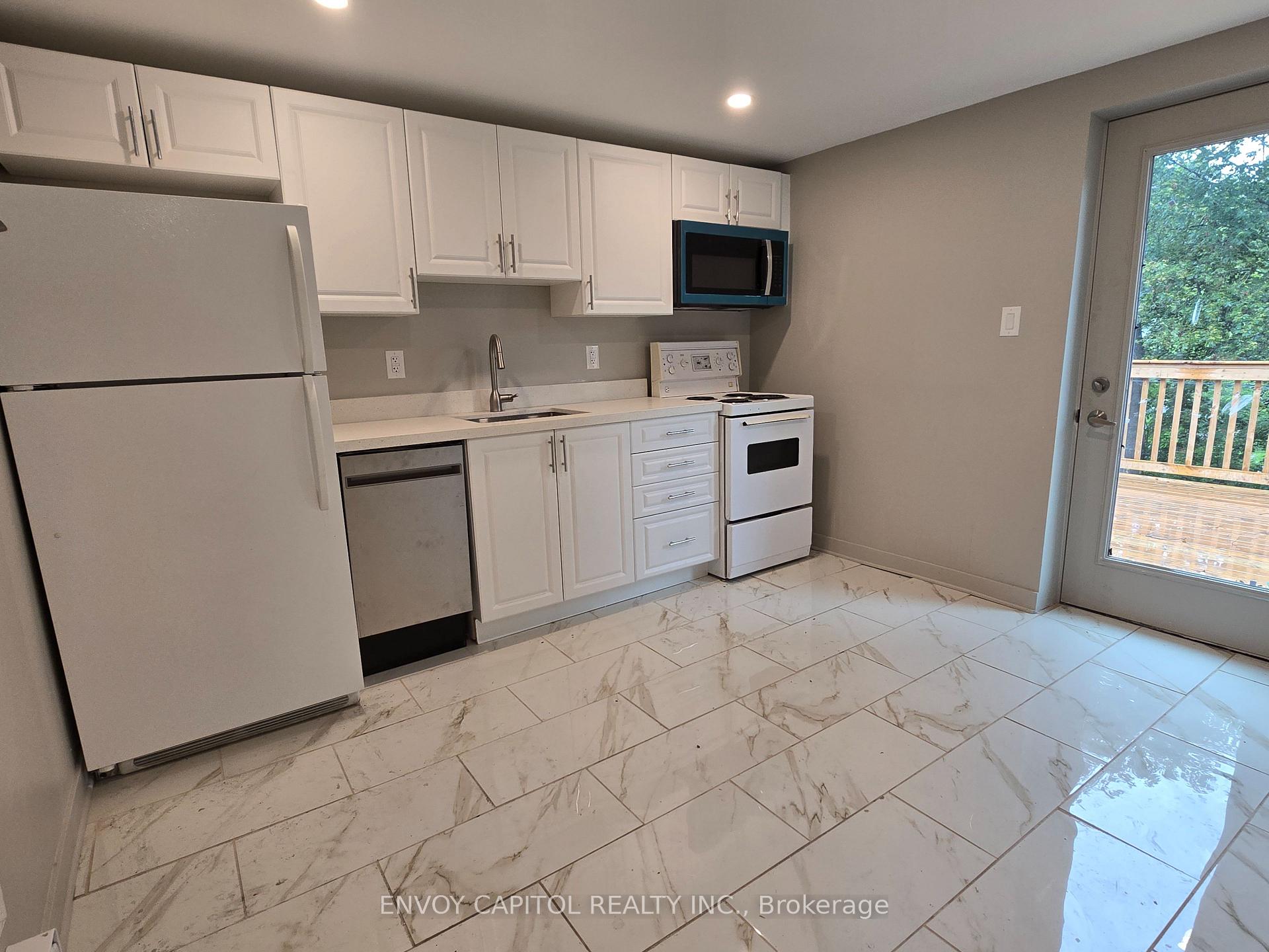 Photo 3 of Unit 1352 Upper, 1354 Queen Street E, Toronto, South Riverdale — HOMEH