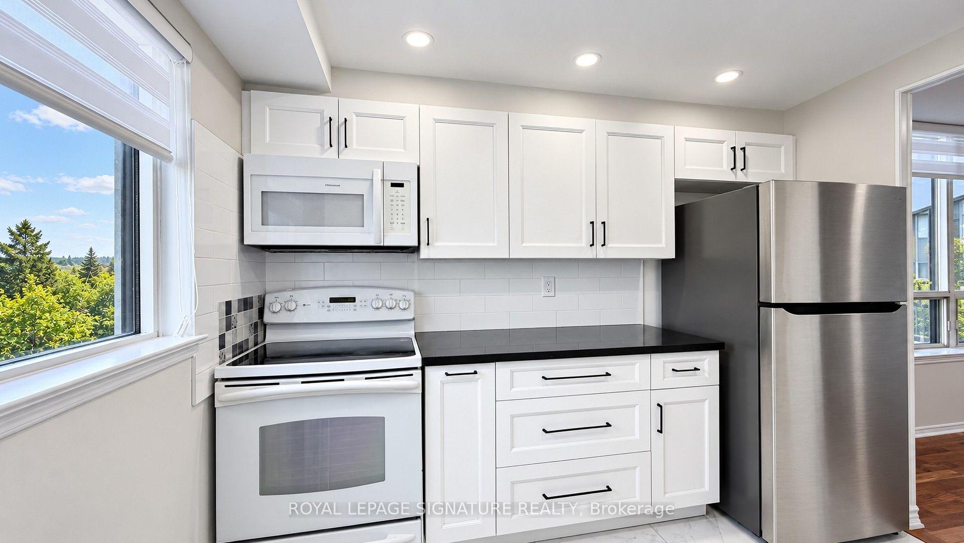 Photo 8 of Unit 411, 7 Bishop Avenue, North York, Newtonbrook East — HOMEH