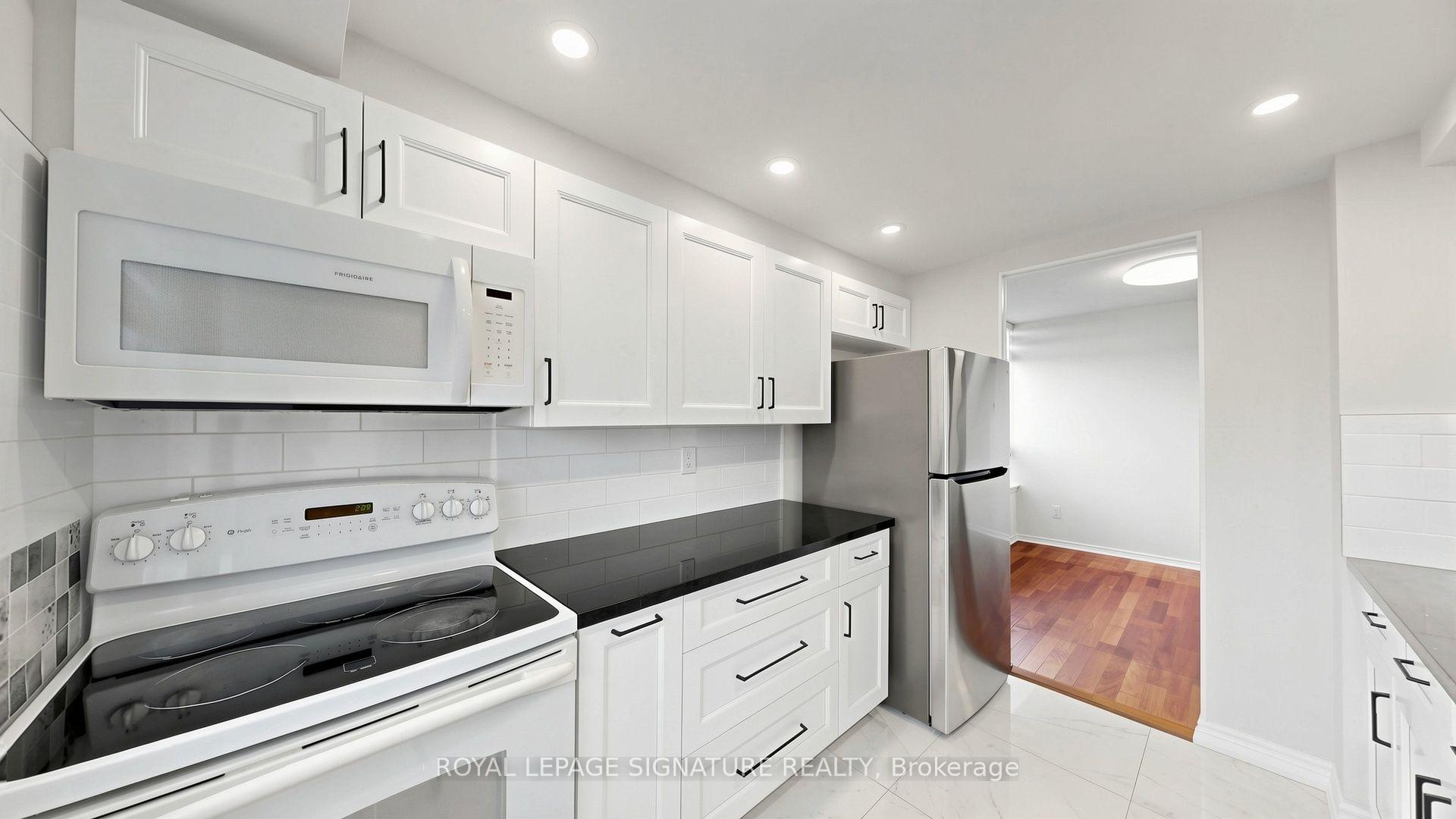 Photo 11 of Unit 411, 7 Bishop Avenue, North York, Newtonbrook East — HOMEH