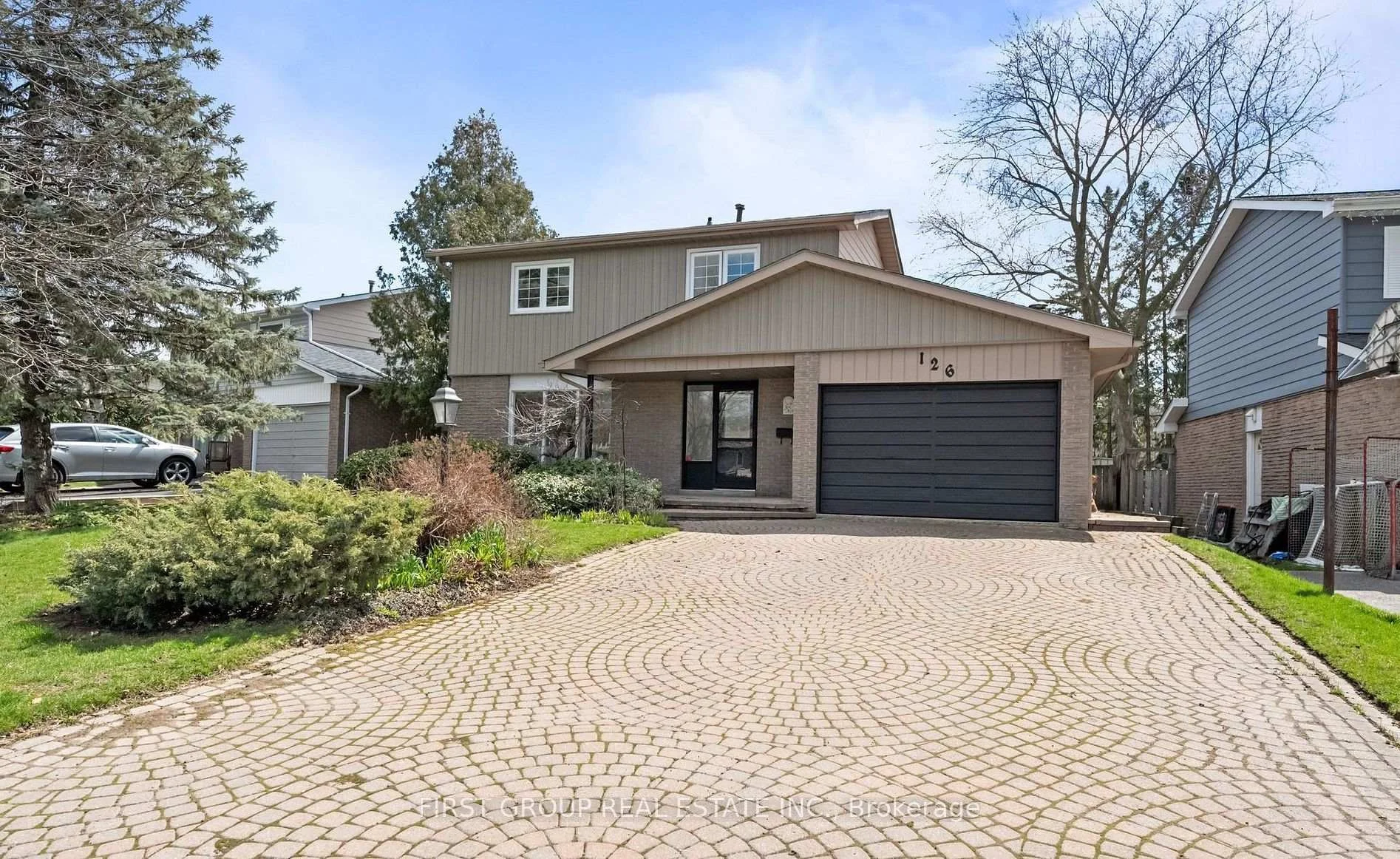 Front of 126 Thicketwood Boulevard