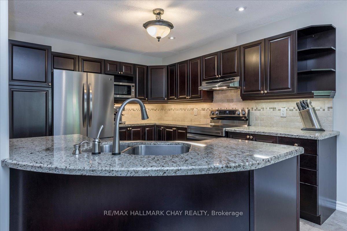 Photo 4 of 974 Booth Avenue, Innisfil, Alcona — HOMEH