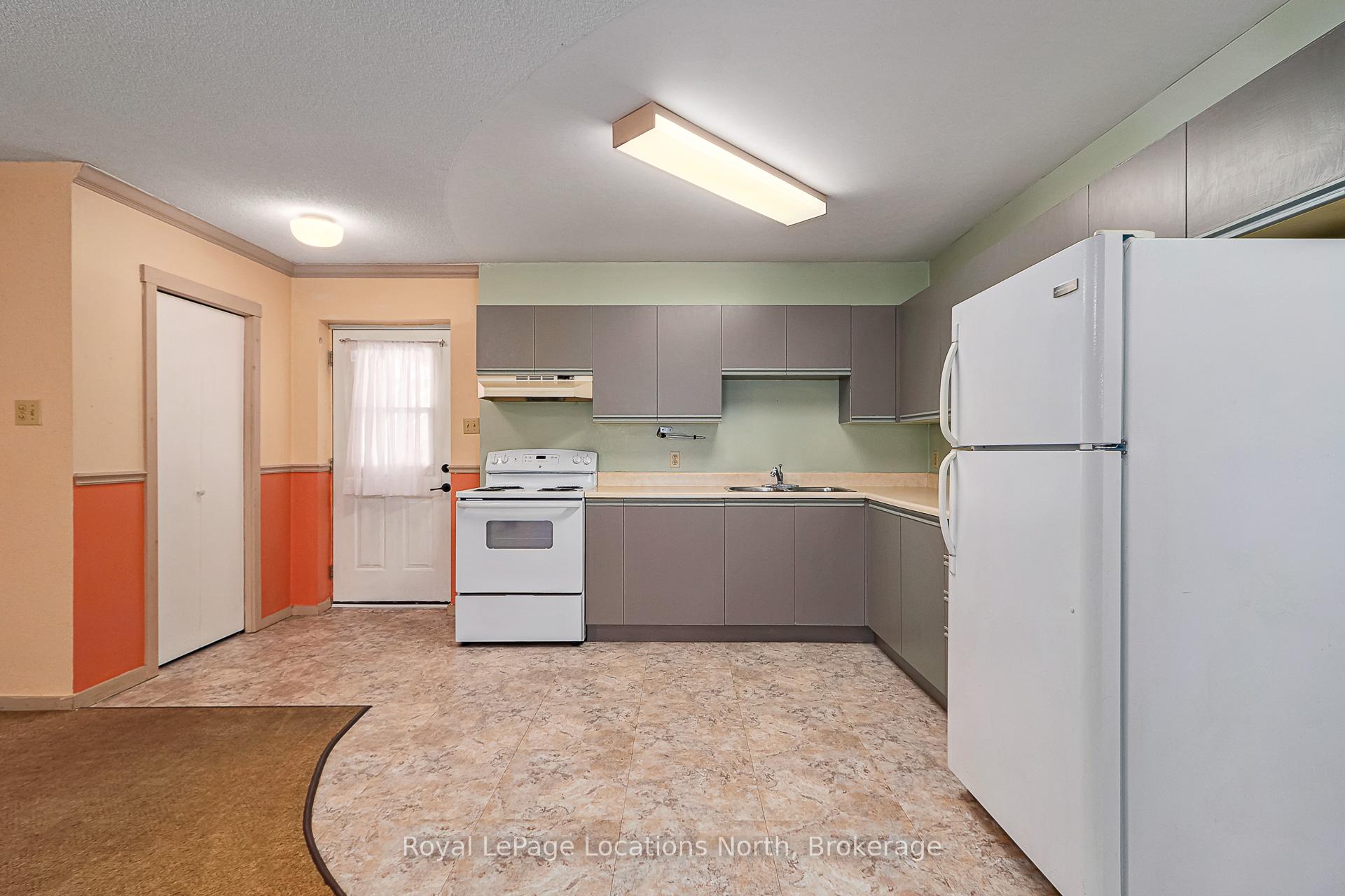 Photo 4 of Unit 1, 891 River Road W, Wasaga Beach — HOMEH