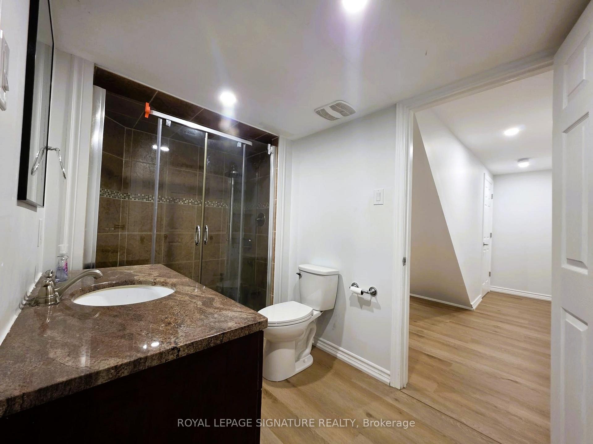 Photo 12 of Unit Bsmt, 148 Tamarac Trail, Aurora, Aurora Highlands — HOMEH